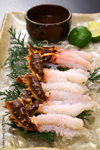Japanese red king crab sashimi. By cold shabu-shabu, the meat of the crab legs becomes like a flower blooming.