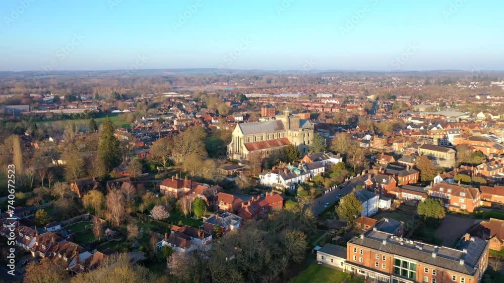 Aerial rising over Romsey UK market town and Romsey Abbey during sunrise 4K Aerial rising over Romsey UK market town and Romsey Abbey during sunrise 4K