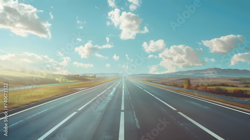 Asphalt road and mountain with sky clouds landscape  © Oksana