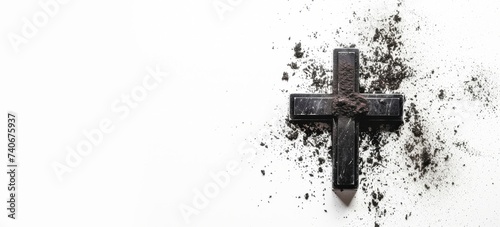 black cross with ashes around isolated on white background horizontal banner , copy space for text easter and Ash Wednesday concept © XC Stock