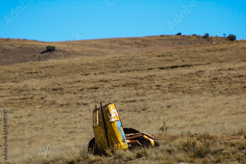 Rusting car in the desert