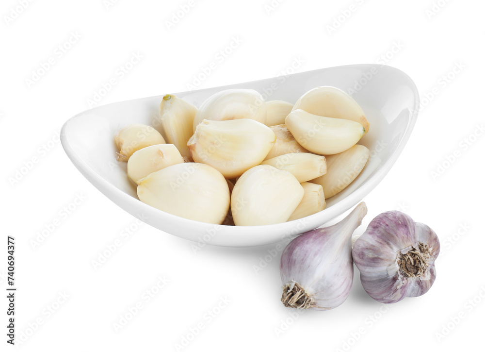 Bulbs and cloves of garlic isolated on white
