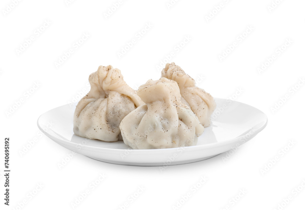 Plate with three tasty khinkali (dumplings) and spices isolated on white. Georgian cuisine