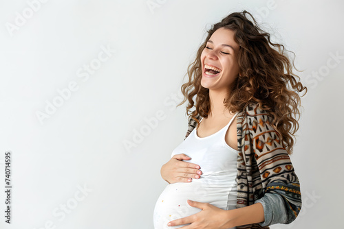 Closeup portrait of happy pregnant woman isolated on white background
