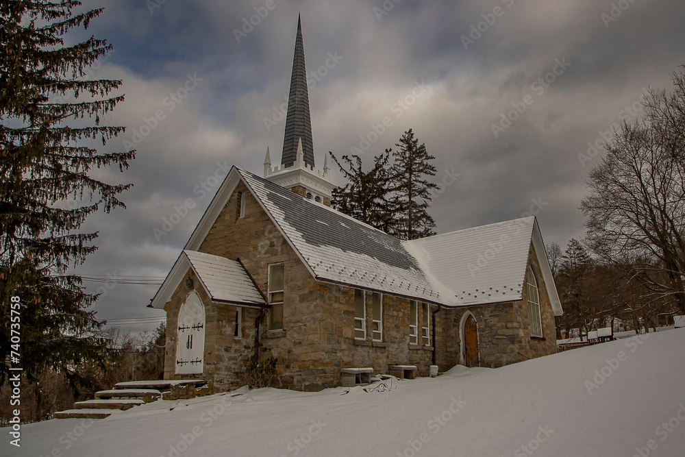 Abandoned church on a snowy winter morning