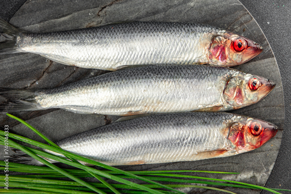herring fish fresh seafood tasty eating cooking meal food snack on the table copy space food background rustic top view 