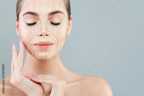Good-looking woman with massage or surgery lines on her face. Medicine, cosmetology and facial treatment concept
