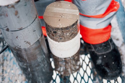 Drilling a hole into a concrete wall with core driller