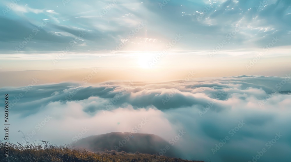 Serene Sunrise Above Cloud-Covered Mountains in a Tranquil Landscape