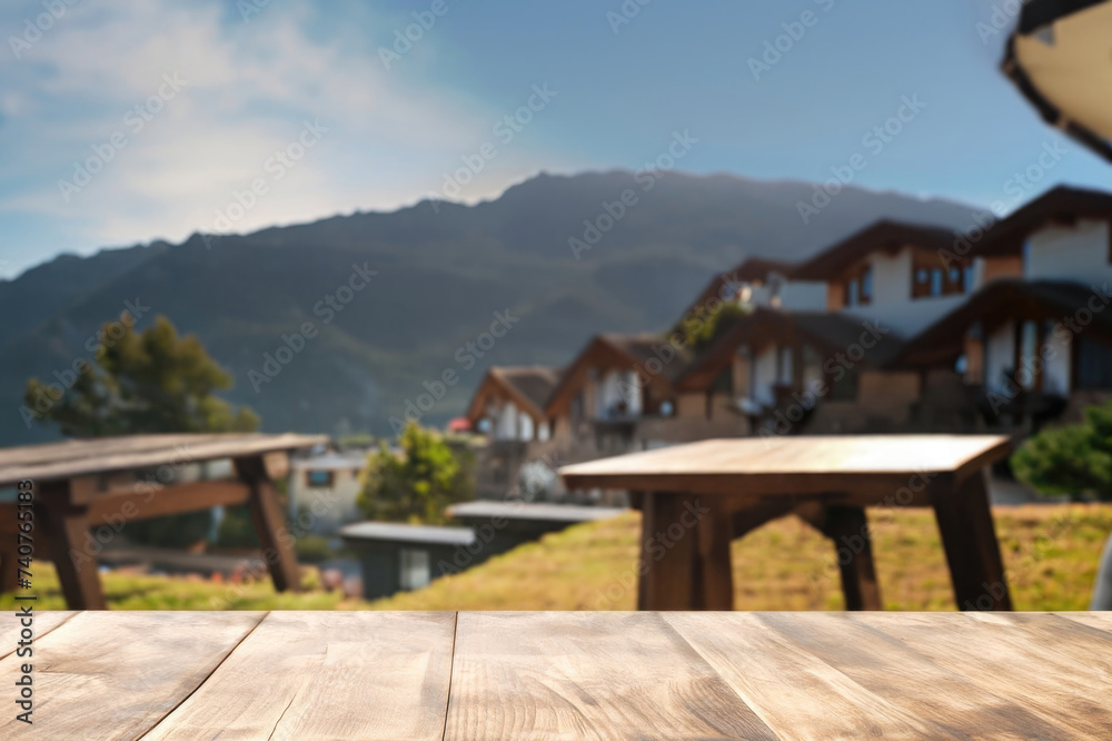 Naklejka premium wooden table for display product, tables of wood for showing goods, empy surface, mountains landscape on the background
