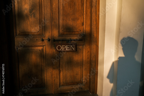 Shadow of men on the in front of door