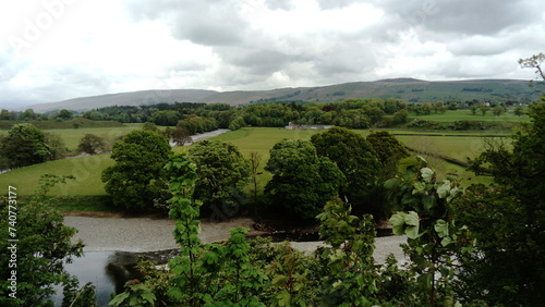 The River Lune ant Kirby Lonsdale in Cumbria, UK overlooking Barbon and the Casterton Hills. photo