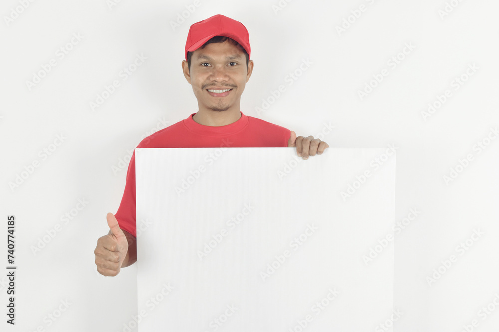 Delivery man holding blank paper with copy space, place for text image. Delivery man holding blank paper with copy space, place for text image.