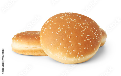 Three fresh hamburger buns isolated on white