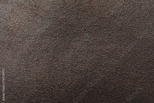 Texture of brown suede fabric as background, top view