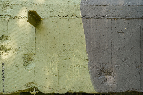 reinforced concrete texture painted with  military camouflage pattern photo