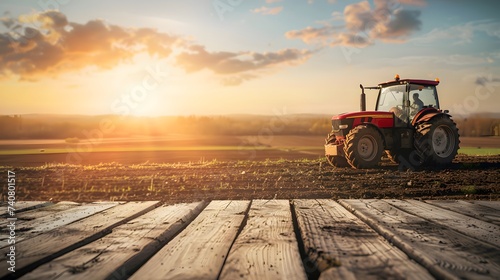 Empty wooden table top with farm landscape whit tractor during the spring, sunset light background. agriculture concept. for display or montage your products.  photo