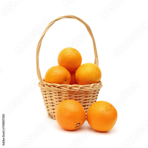 Orange fruits in basket on the white background  photo
