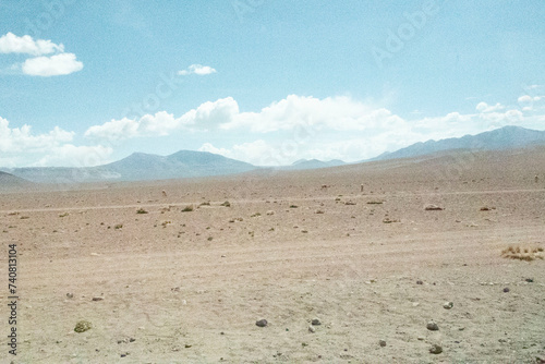 Bolivia Mountain Landscapes. Uyuni mountain views with dirt tracks and arid desert landscapes.