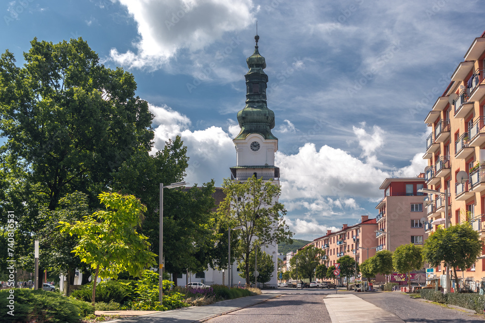 Cityscape of Zvolen, Slovakia on a sunny summer day: Námestie SNP square and Saint Elizabeth Church (Kostol sv. Alžbety) aside of residential area