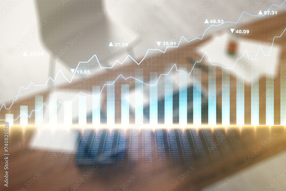 Multi exposure of abstract financial graph and modern desktop with pc on background, financial and trading concept