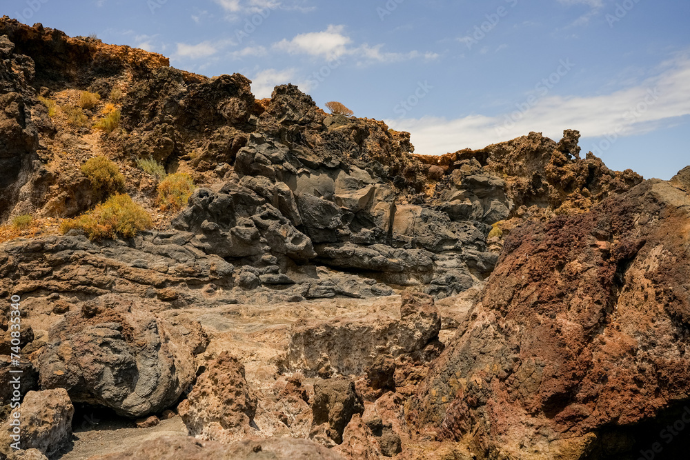 Beautiful rocks and turquoise sea on the coast of the Canary Islands, Tenerife Spain.	