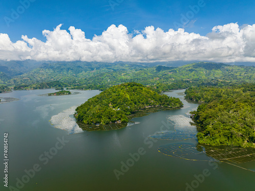 Lake Sebu and mountain with forest, jungle and trees. Blue sky and clouds. Mindanao, Philippines. Travel concept.