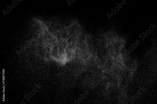 Abstract splashes of water on black background. White explosion. Light overlay texture. 