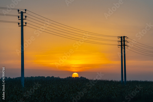 Power lines in sunset