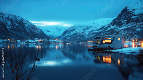 Luxury very rich motorhome on the background of the Norwegian fjords at night. Concept of the Quite Luxury photo