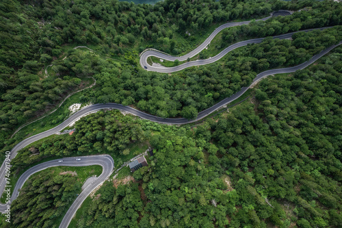 Curvy road in Slovenia Mountains, top down drone aerial view © marcin jucha
