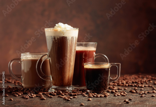 Fototapeta Naklejka Na Ścianę i Meble -  Various coffee and chocolate drinks on a brown background.