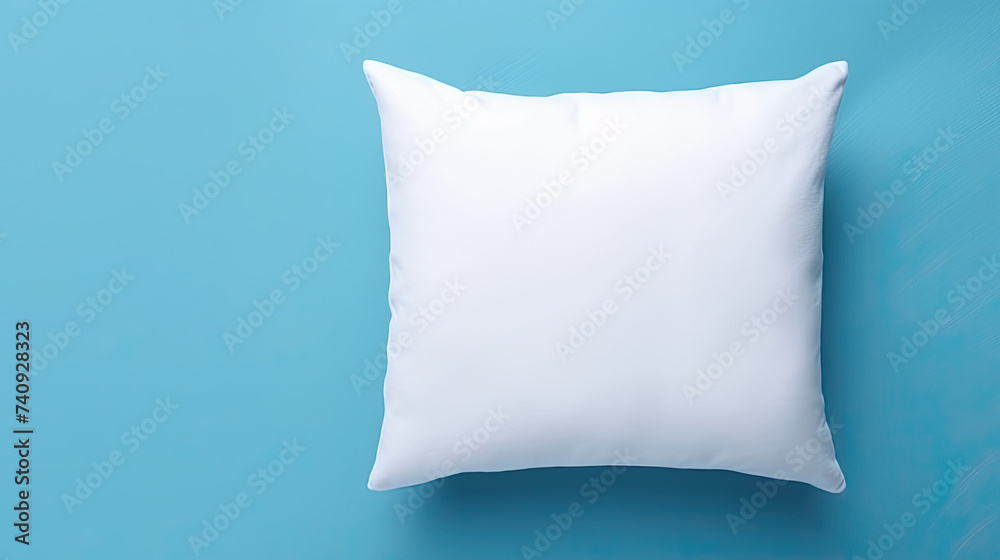 White Soft Pillow isolated on blue background White Soft Pillow isolated on blue background