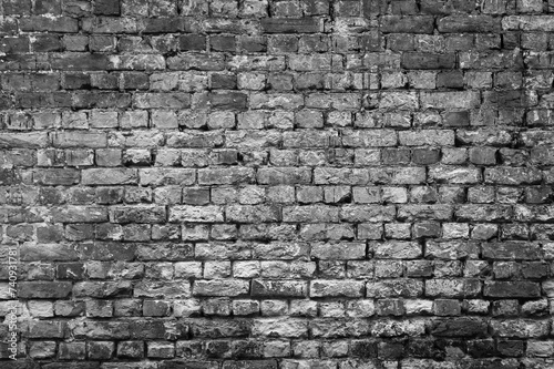 old brick wall close up in gray color