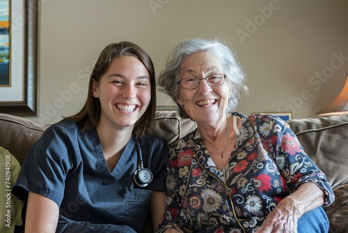 Assisted living caregiver with a smile, a sense of humor and a sweet laugh with an old lady in her retirement home. Elderly caregiver with a bright smile, a sense of humor and a sense of support with © Zaleman