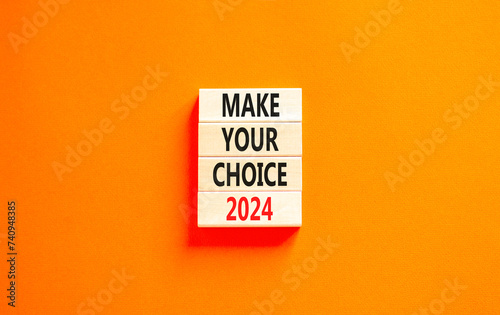 Make your choice 2024 symbol. Concept words Make your choice 2024 on beautiful wooden block. Beautiful orange table orange background. Business Make your choice 2024 concept. Copy space.