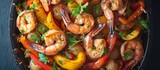 A close up of a skillet filled with shrimp and peppers, a delicious seafood dish ready to be served at the event