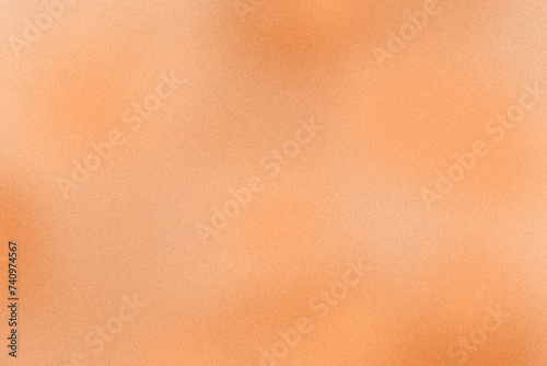 A gradient in trending peach fuzz pantone color with film grain