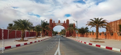 Street view of the beautiful architecture made of red clay in the city of Timimoun, Algeria © Hocineharoun
