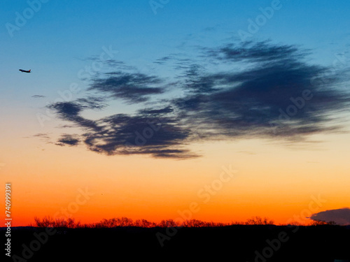 Airplane in sunrise.