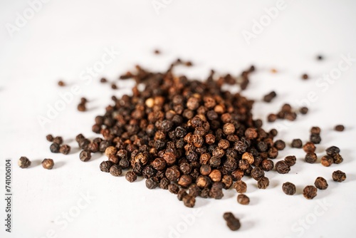 Whole black pepper | Dry peppercorn background, selective focus