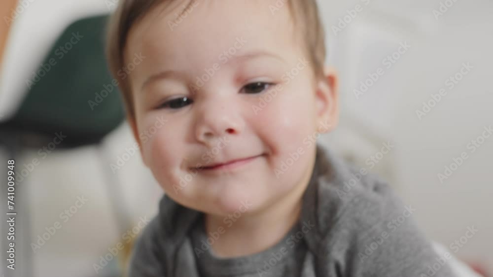 Baby boy playing and smiling Baby boy playing and smiling