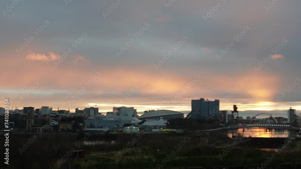 Spectacular sunrise over Glasgow skyline and River Clyde Spectacular sunrise over Glasgow skyline and River Clyde