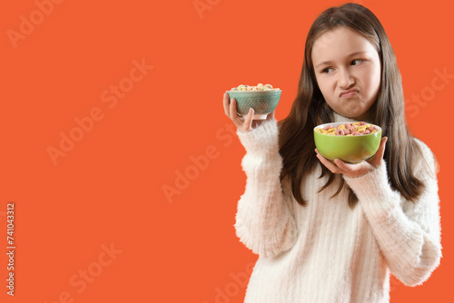 Displeased little girl with...