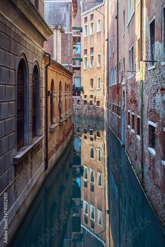 Morning view of a canal in Venice, Italy 