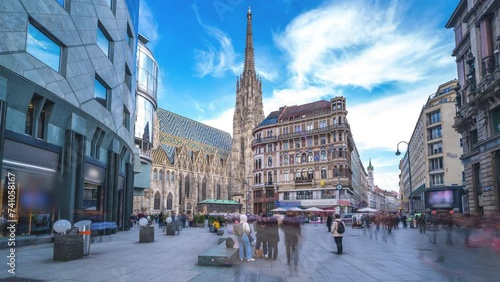 Vienna St. Stephen's Cathedral (Stephansdom) is the mother church of the Roman Catholic Archdiocese of Vienna timelapse, hyperlapse video. People walking on The Stephansplatz square, Vienna Austria photo
