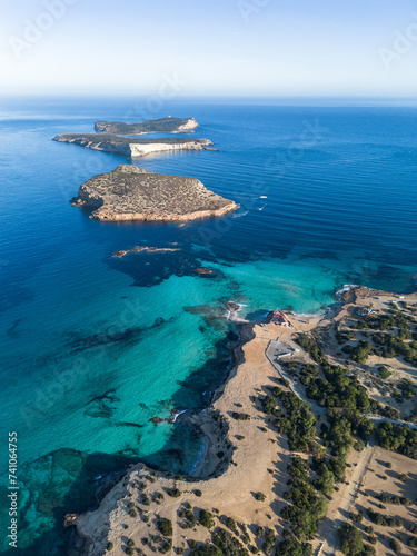 Aerial view of Cala Comte beach and islets in Ibiza island