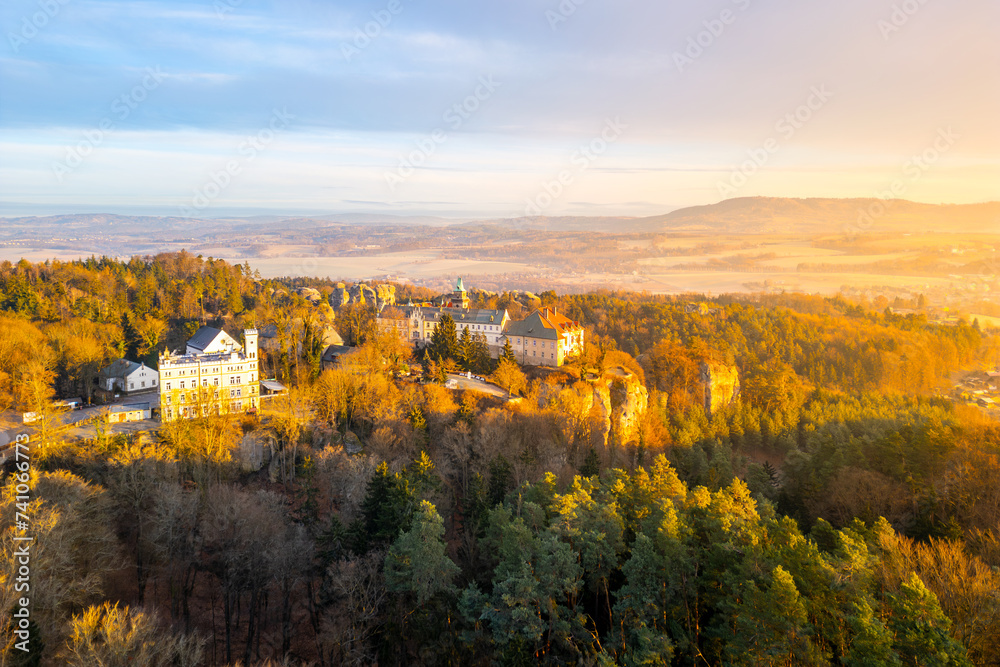 Hruba Skala chateau at cold morning sunrise time. Bohemian Paradise, Czech: Cesky raj, Czechia. Aerial view from above.