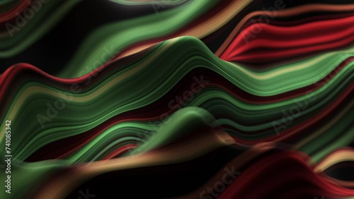 Abstract, fluid, wavy and colorful 3D lines seamless loop animation. Modern and contemporary feel in 4K. Metallic, iridescent and reflective with shades of green, red, orange, black, yellow