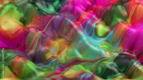 Vibrant, colorful, fluid and wavy abstract paint seamless loop animation. Modern and contemporary style in 4K with shades of magenta, green, cyan, orange, pink, red